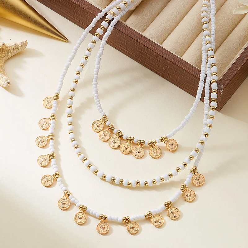 🔥 Laatste dag! 49% korting - 📿 Meerlaagse parel- en gouden muntketting