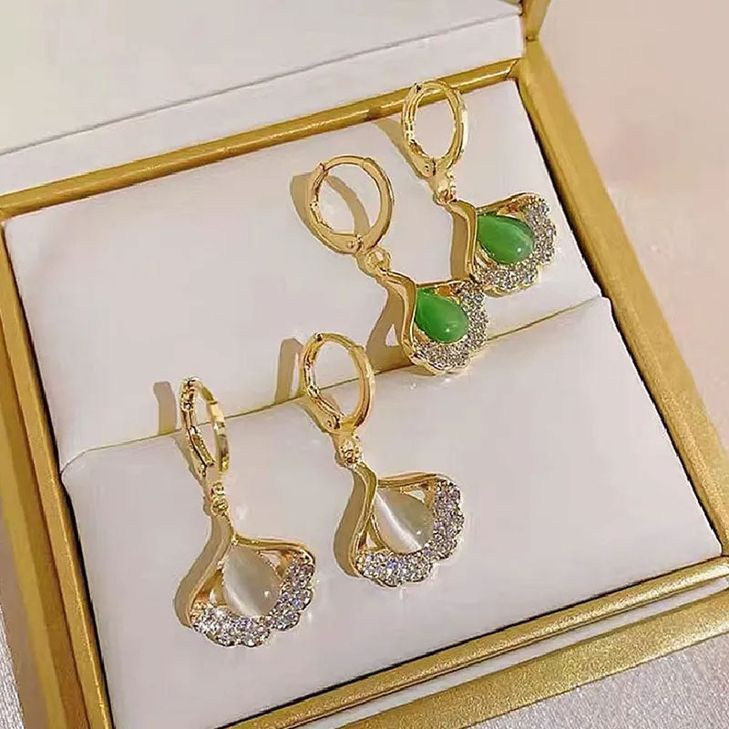🌟 Elegante Ginkgo & Opaal Oorbellen