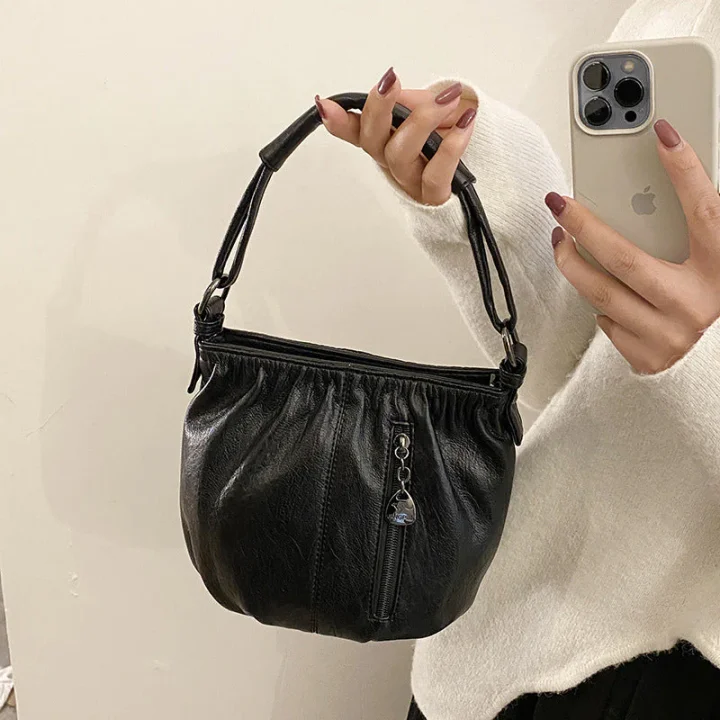 ⏳Tijdelijke aanbieding⏰ Geplooide leren bucket bag – Zacht materiaal, verstelbare schouderband en chique casual stijl ✨